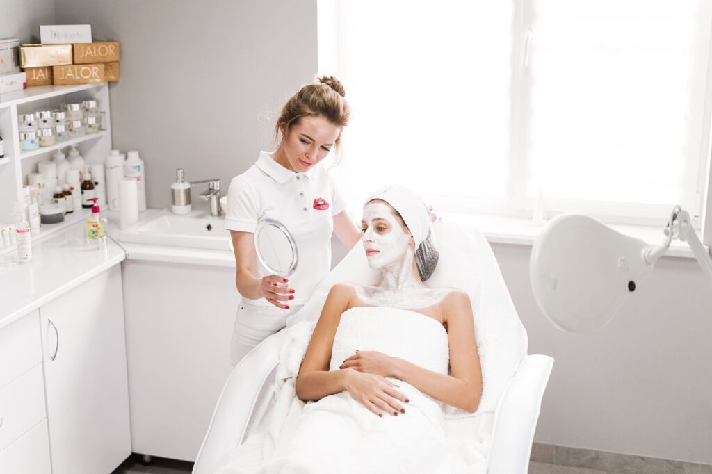 Esthetician performing professional facial treatment
