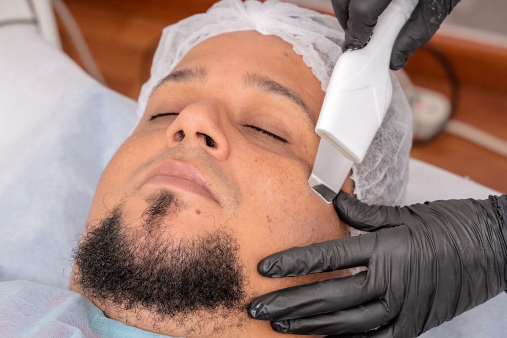 Skincare professional applying treatment to skin