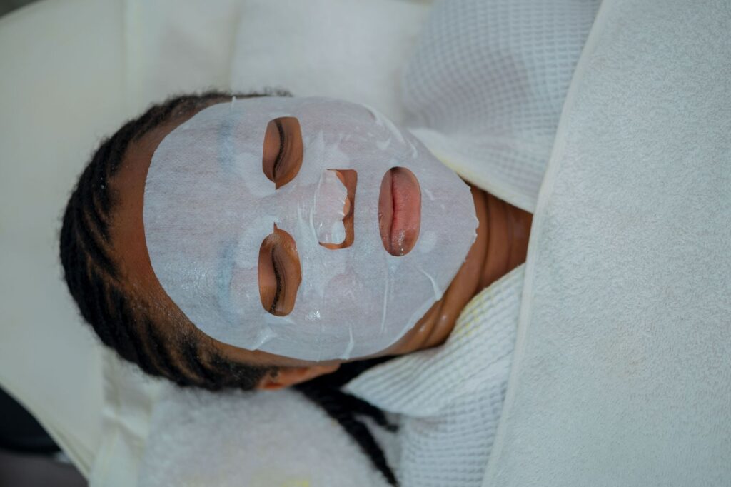 Close-up of facial treatment application with natural products